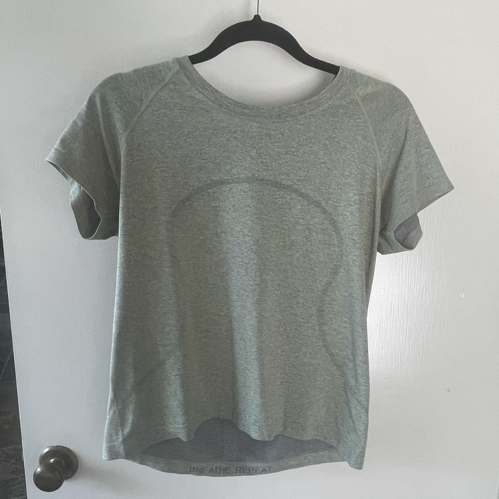 Ladies Lulu Lemon, Heather green Tee, size 12, like new, worn twice